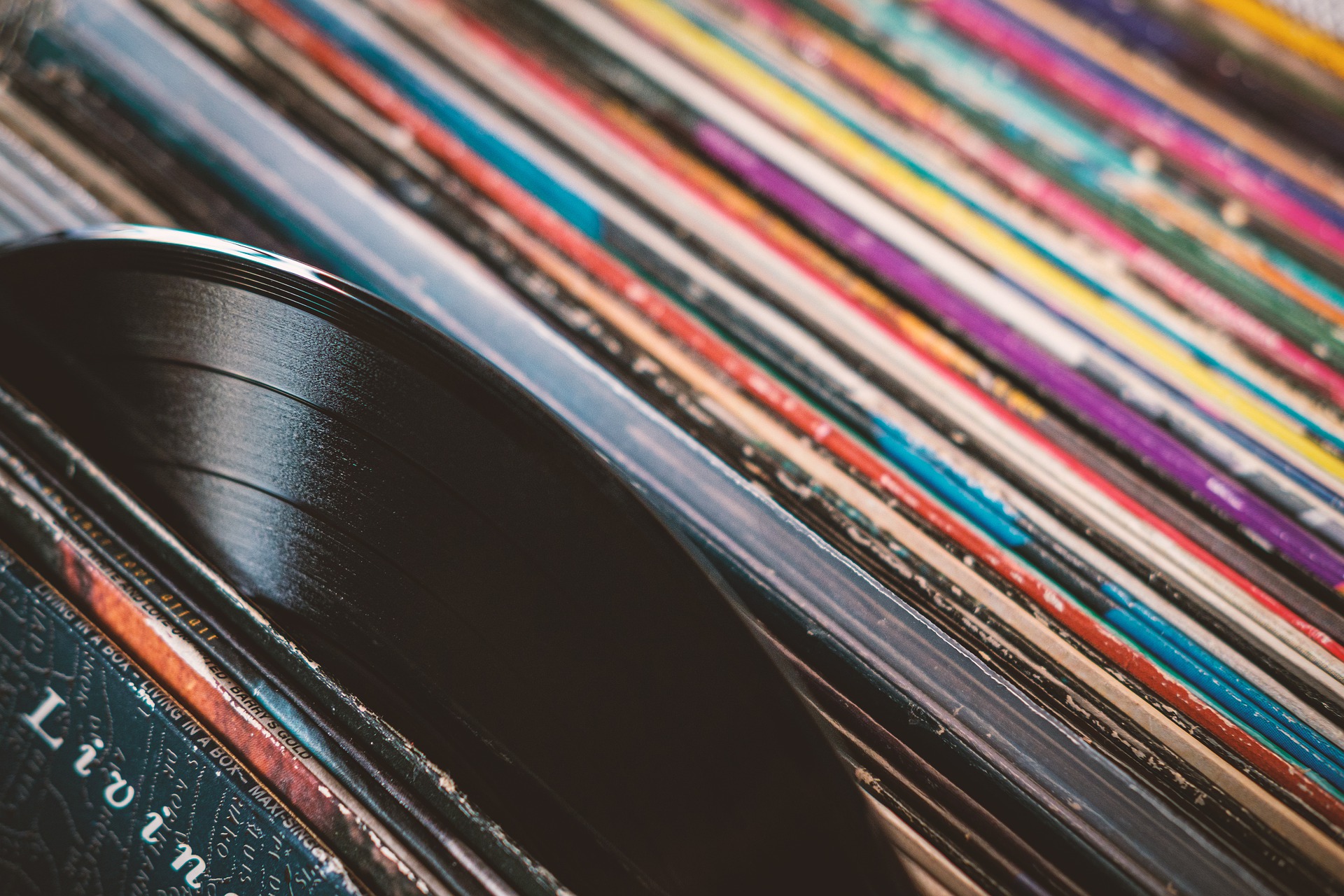 A close-up of vinyl records in their sleeves.